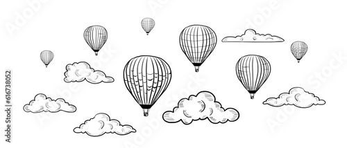 Vector Hand Drawn Doodle Set of Flying Air Balloons Isolated on White Background. Black and white Sketch of Hot Air Balloons Set with Clouds Drawing. Eco Green Transportation for Clean Environment.