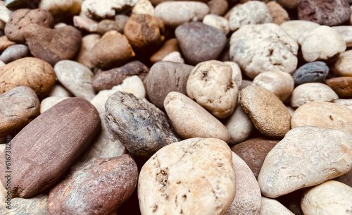 pebble  rock  textured  smooth  round  abstract  decoration  gravel  nature  small  outdoor  garden  mineral  material  stone  shape  wallpaper  background  texture  surface  rough  ground  wall  sea 
