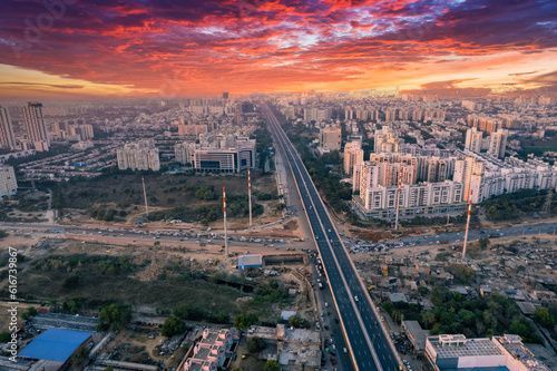 aerial drone still shot showing busy sohna elevated highway toll road with traffic stuck at interesction due to road construction of bridge or underpass