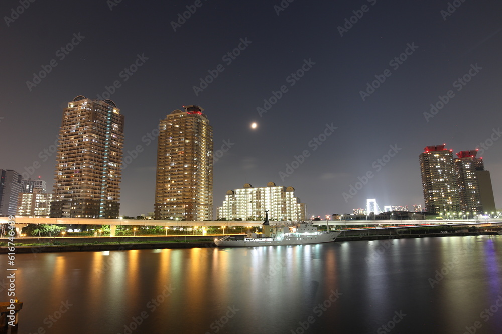 Night view of Odaiba high-rise apartments in Japan Night view of Odaiba high-rise apartments in Japan