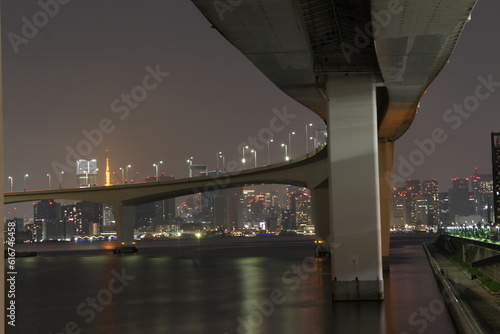 Night view of Odaiba high-rise apartments and highway in Japan