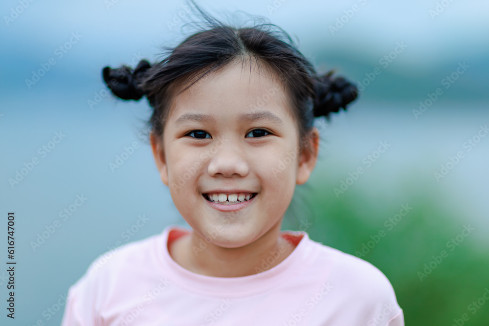 Innocent Smiles Children : Portrait of an Asian Girl, 6-8 Years Old kid. Innocent Smiles Children : Portrait of an Asian Girl, 6-8 Years Old kid.