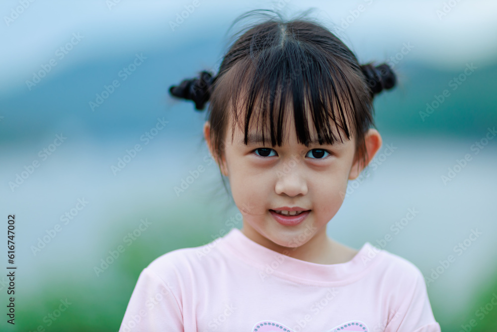 Innocent Smiles Children : Portrait of an Asian Girl, 6-8 Years Old kid. Innocent Smiles Children : Portrait of an Asian Girl, 6-8 Years Old kid.