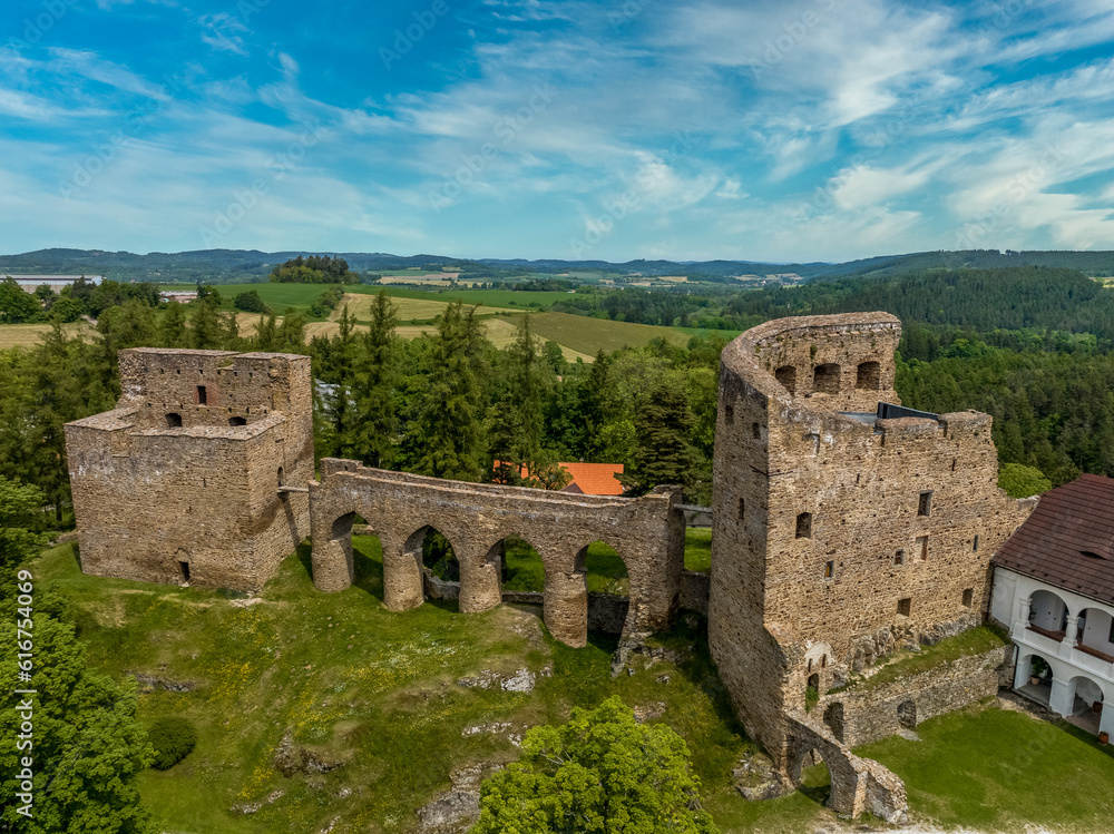 Aerial view of Velhartice castle in Bohemia with two Gothic palaces connected by a unique stone bridge