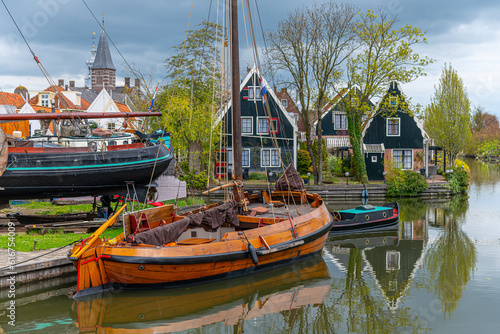 Two old wooden fishing boats at the shipyard in the village of Edam  Netherlands