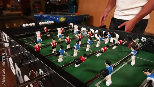 Wallpaper Mural People play table football in a cafe. Close-up Torontodigital.ca