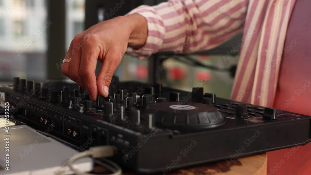 A DJ is playing music. Close-up A DJ is playing music. Close-up