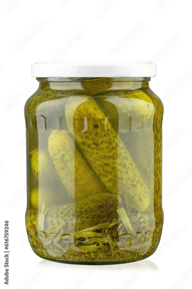 Canned cucumbers in a jar. Isolated on white background. Canned cucumbers in a jar. Isolated on white background.