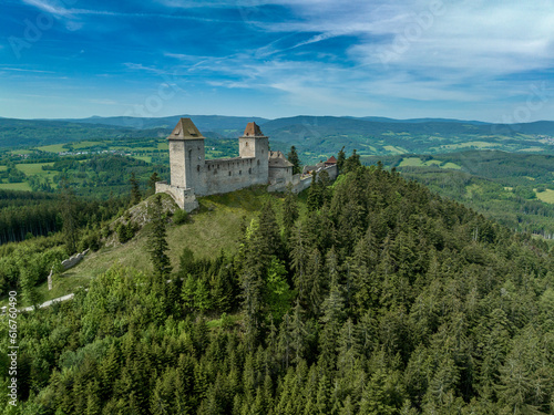 Aerial view of Kasperk Hrad or Karlsberg castle in Czechia. The central part of the castle consists of two residential towers and an oblong palace which was built between them