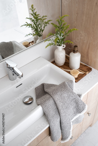 Slika na platnu detail in bathroom interior with modern washbowl and decor