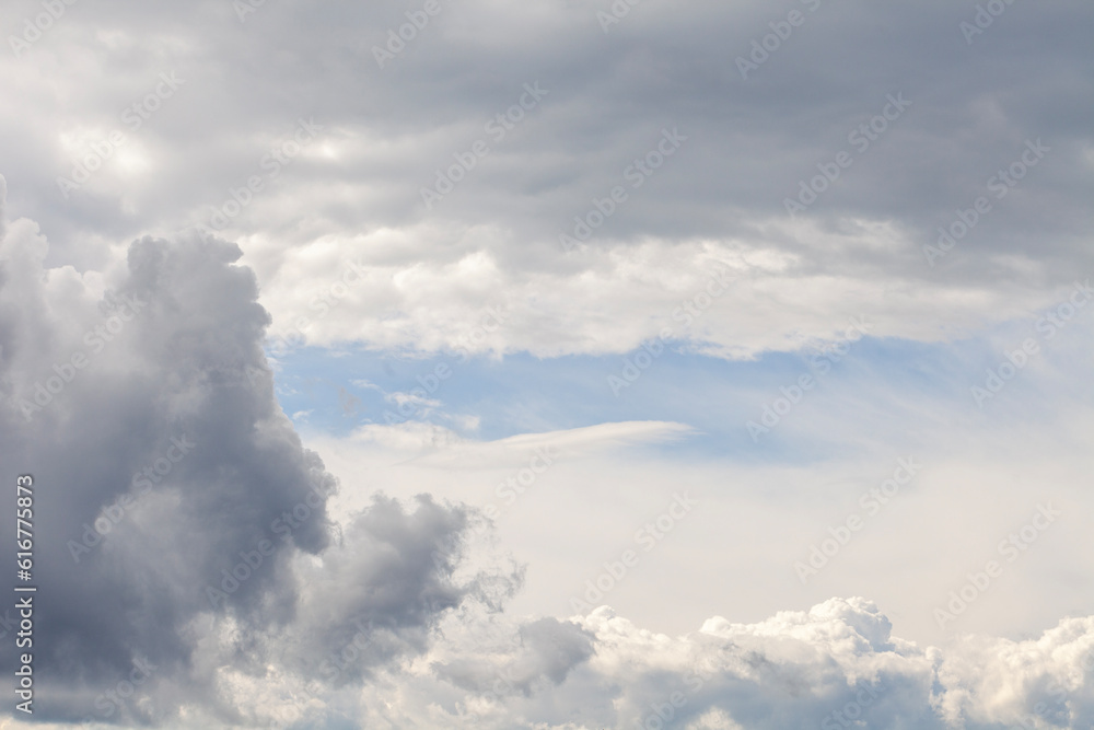 Afternoon clouds in the summer sky. Afternoon clouds in the summer sky.