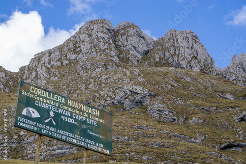 Cordillera huayhuash sign in the mountains, Cuartelhuain campsite, Andes. photo
