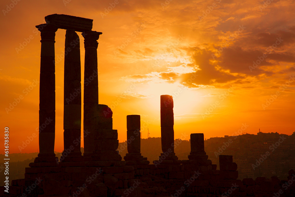 Temple of Hercules in Amman Citadel comples in the orange sunset or sunrise, Jordan. 