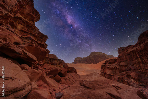 Majestic view of the Wadi Rum desert, Jordan, The Valley of the Moon. Orange sand, Milky Way sky.