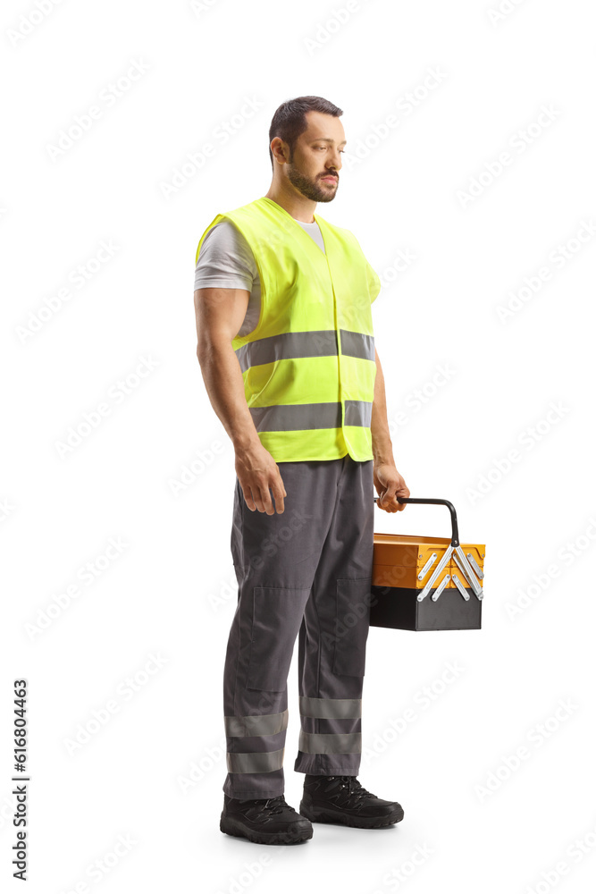 Road assistance mechanic holding a tool box Road assistance mechanic holding a tool box