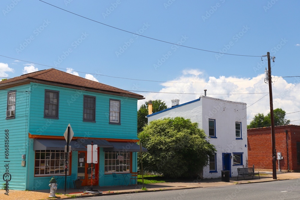 Old Colorful Buildings on Deserted Street in Small Town USA Old Colorful Buildings on Deserted Street in Small Town USA