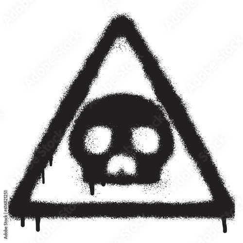 Danger warning icon graffiti with black spray paint
