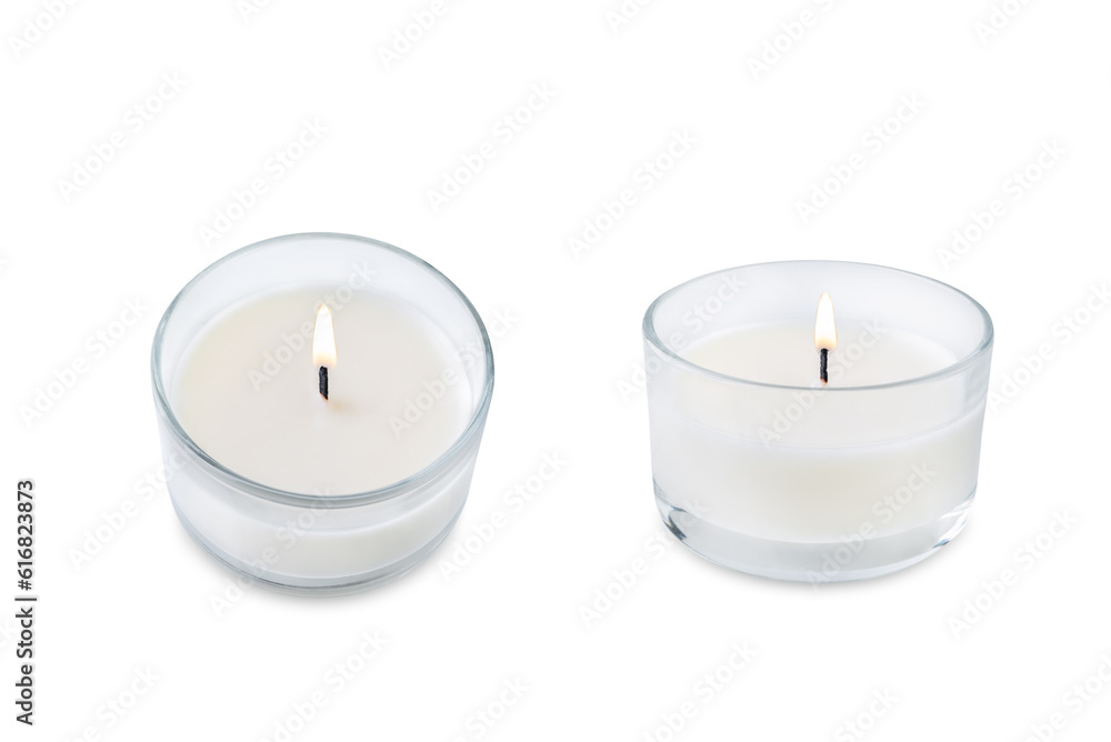 Burning candle on a white isolated background Burning candle on a white isolated background