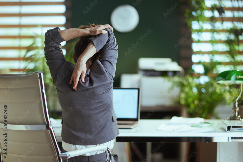 © Alliance - modern business woman in modern green office stretching hand © Alliance - modern business woman in modern green office stretching hand