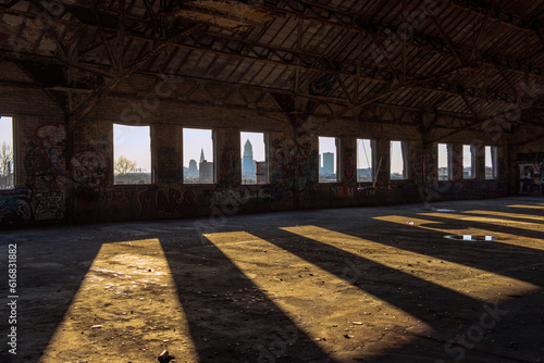 Abandoned industrial building at sunset photo