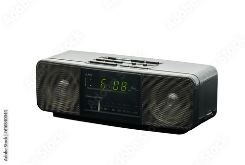 Old stereo alarm clock radio isolated with cut out background.