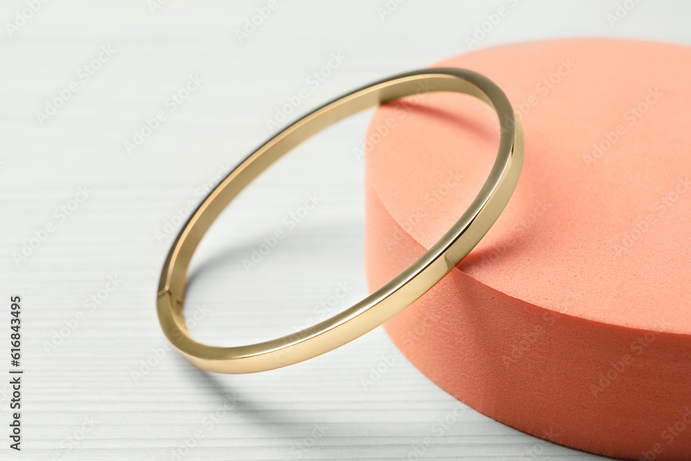 Stylish presentation of bracelet on podium, closeup Stylish presentation of bracelet on podium, closeup