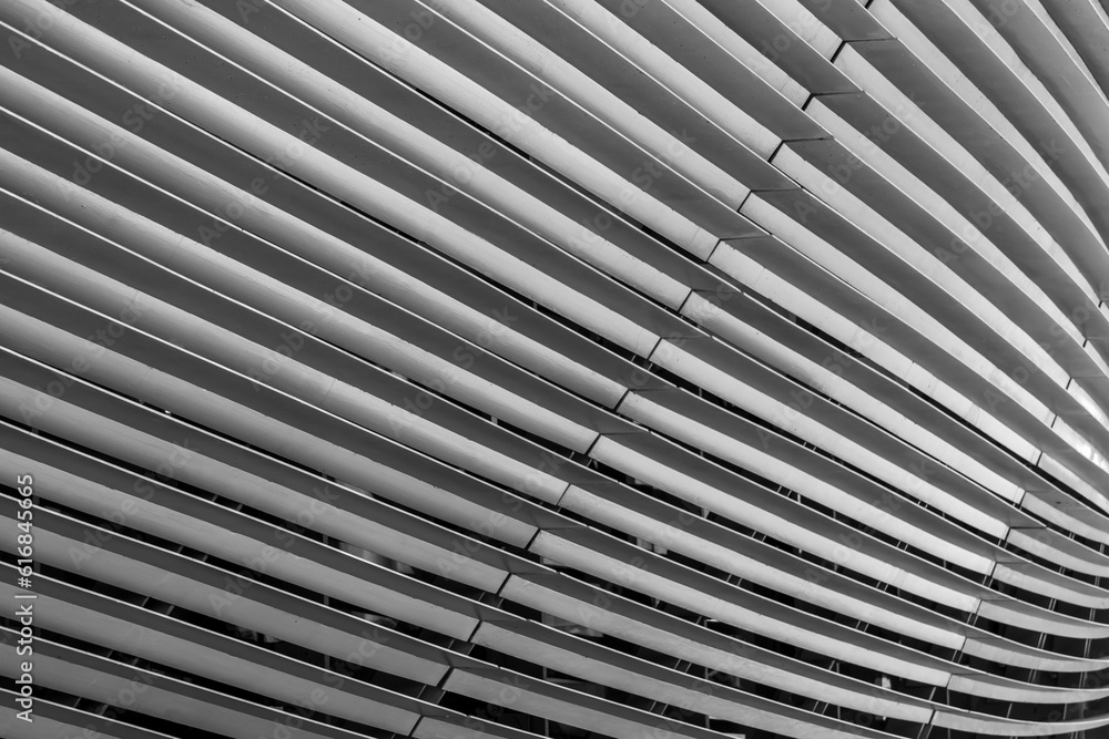 Close up view of silver corrugated metal wall for background use. Close up view of silver corrugated metal wall for background use.