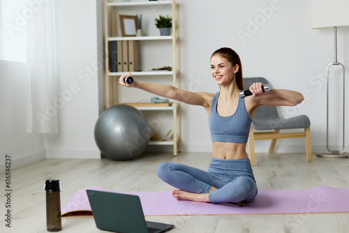 woman training video health yoga gray lifestyle home laptop lotus mat