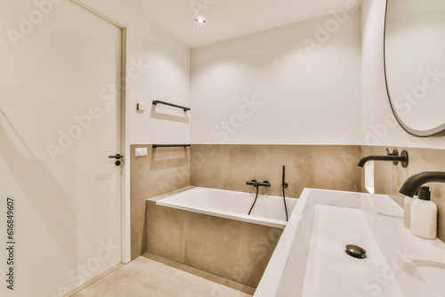 a modern bathroom with two sinks and a large mirror on the wall in the background is an open shower stall