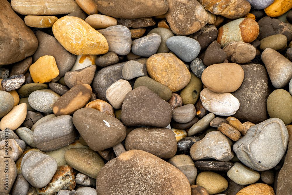 Closeup of a pile of Colorful Pebbles on the beach Closeup of a pile of Colorful Pebbles on the beach