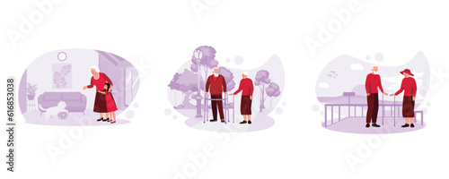 The moment the grandson hugs Grandma and plays with the cat. Portrait of an elderly couple walking with walkers in the park. An elderly couple was standing with sticks on the beach railing. Trend Mode