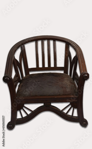 Close Up Of A Vintage  Antique Wooden Arm Chair With Cushion Isolated On a White Background