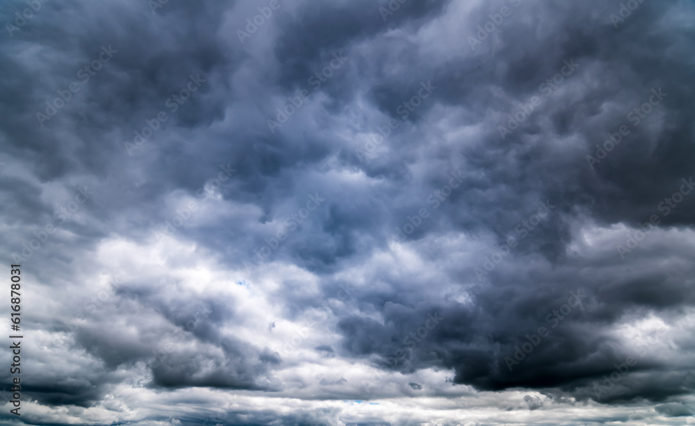 Dark sky with stormy clouds. Dramatic sky ,Dark clouds before a thunder-storm. Dark sky with stormy clouds. Dramatic sky ,Dark clouds before a thunder-storm.