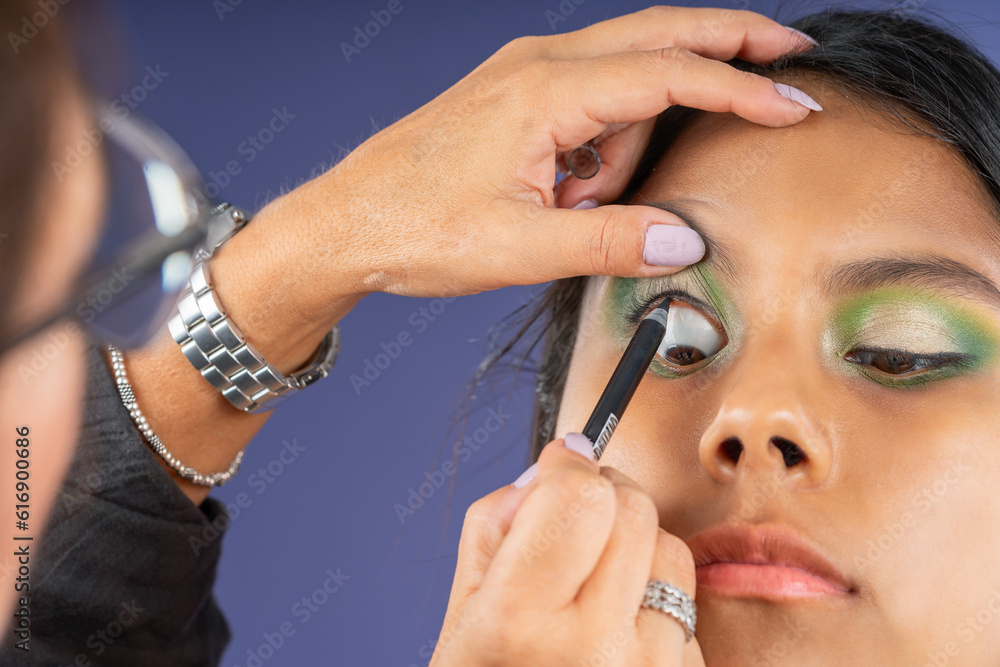 Eye makeup on young woman with open eyes Eye makeup on young woman with open eyes