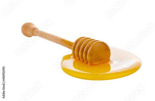 Wooden honey dipper with honey on transparent png