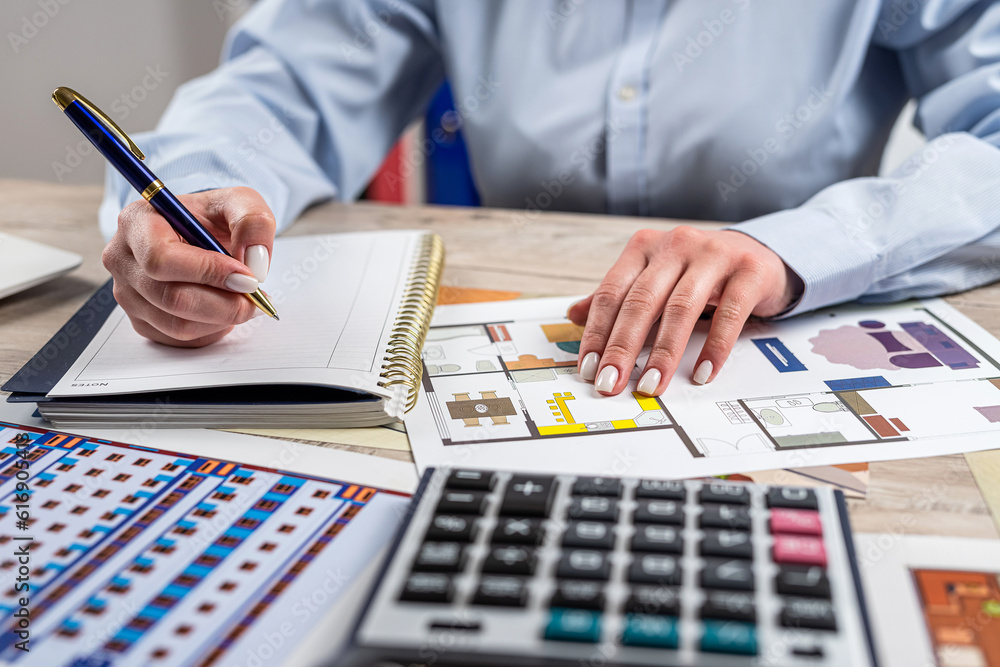 designer woman working blueprint architectural project and tools at office desk designer woman working blueprint architectural project and tools at office desk