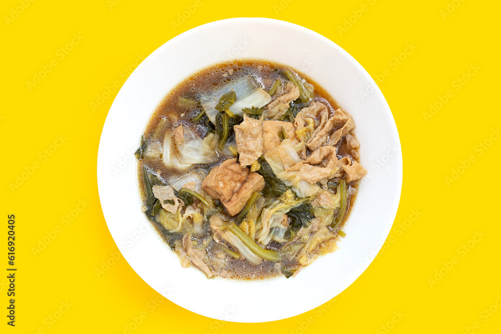 Mixed vegetable stew wih tofu in white bowl Mixed vegetable stew wih tofu in white bowl