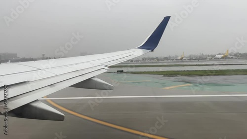 Commercial airplane running down the runway of Los Angeles International Airport and taking off from this city in the state of California in USA.