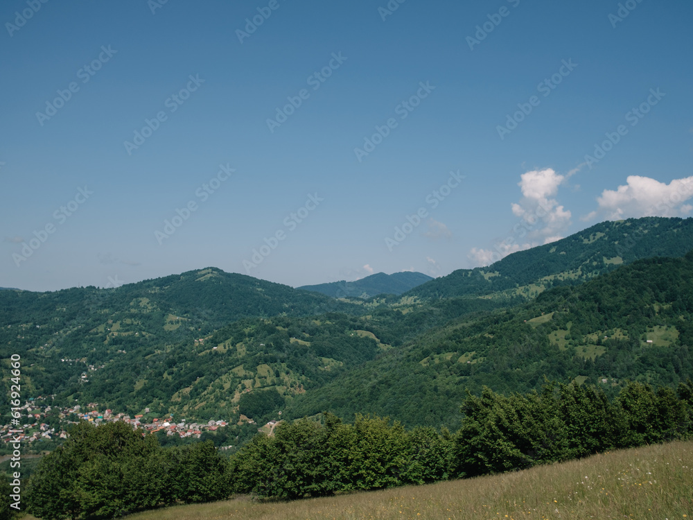 Fototapeta premium Enchanting Summer Landscape of Carpathian Mountains in Mist