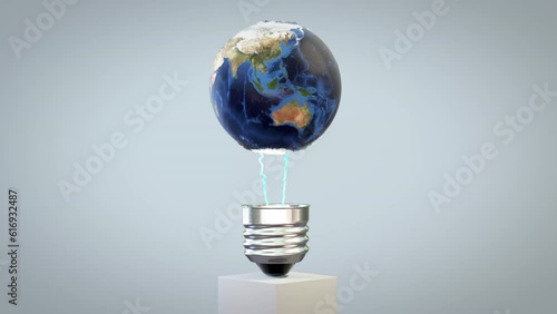 Earth planet revolving on a lightbulb with lightnings, loop, Luma Matte photo