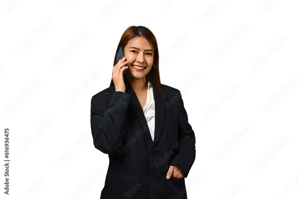Positive asian businesswoman in black suit talking on mobile phone isolated on white background Positive asian businesswoman in black suit talking on mobile phone isolated on white background