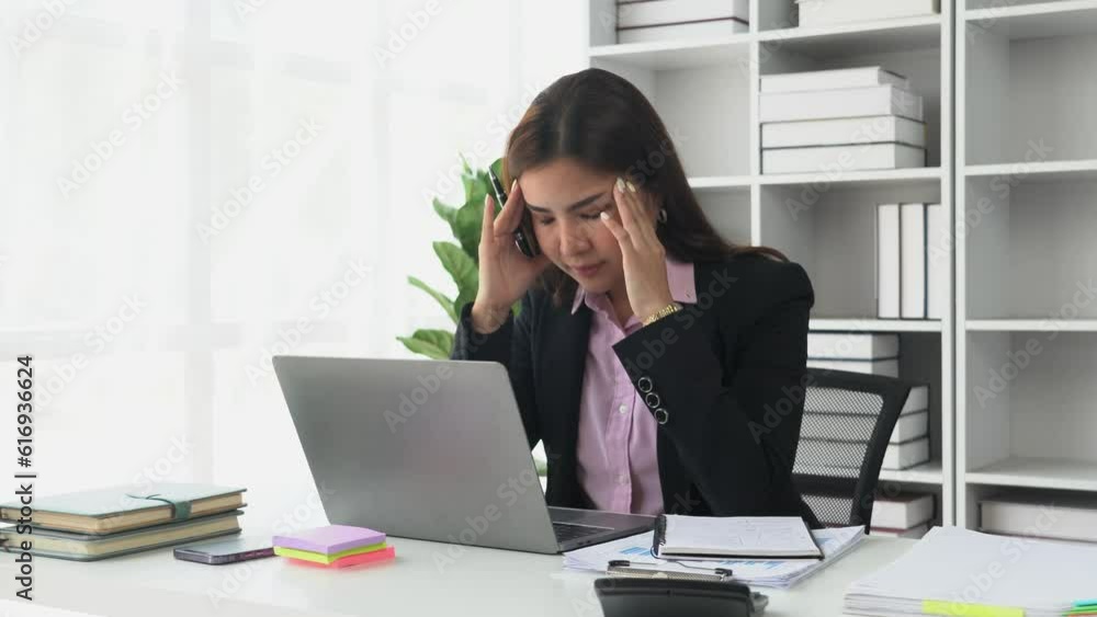 Business concept, Businesswoman working is talking financial data at office Business concept, Businesswoman working is talking financial data at office