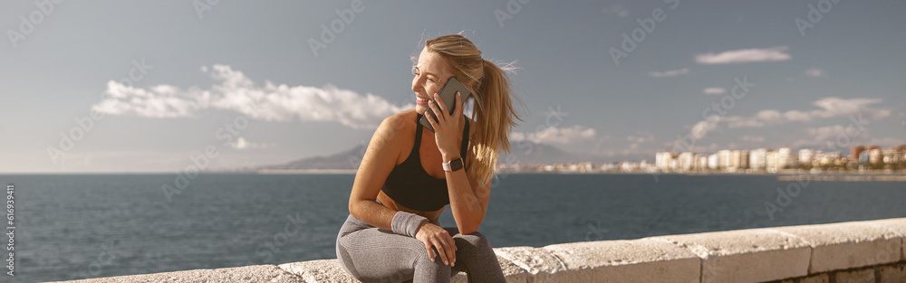 Young attractive female breathing fresh air outdoors