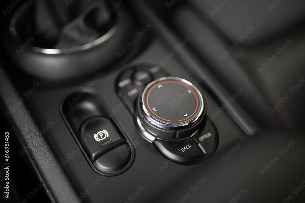 Car multimedia system control joystick. Radio, multimedia, and navigation adjustment buttons 
