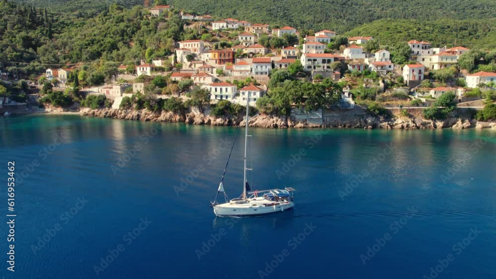 Sailing boat in a picturesque Kioni village, Ithaca island, Kefalonia, Greece Sailing boat in a picturesque Kioni village, Ithaca island, Kefalonia, Greece