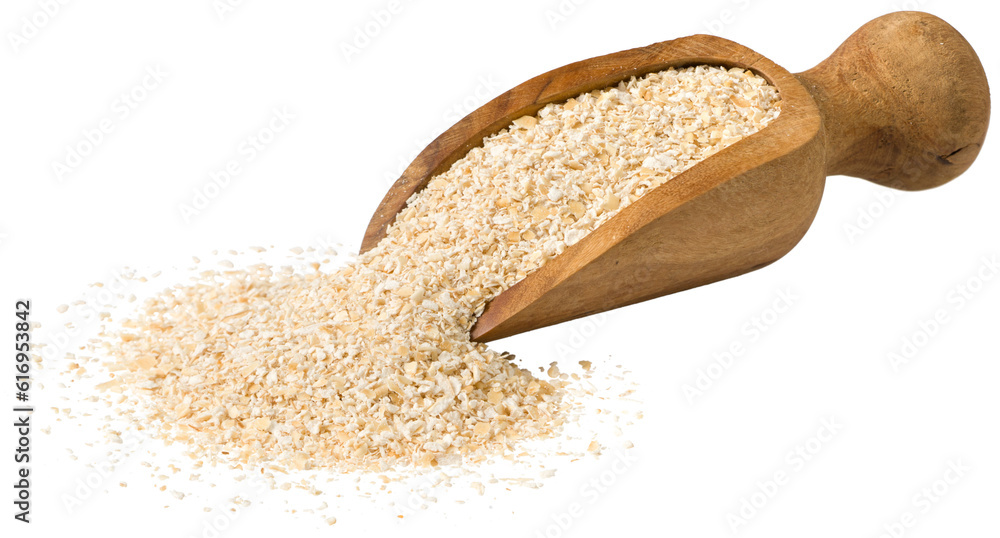 Uncooked oat bran in the wooden scoop, isolated on white background