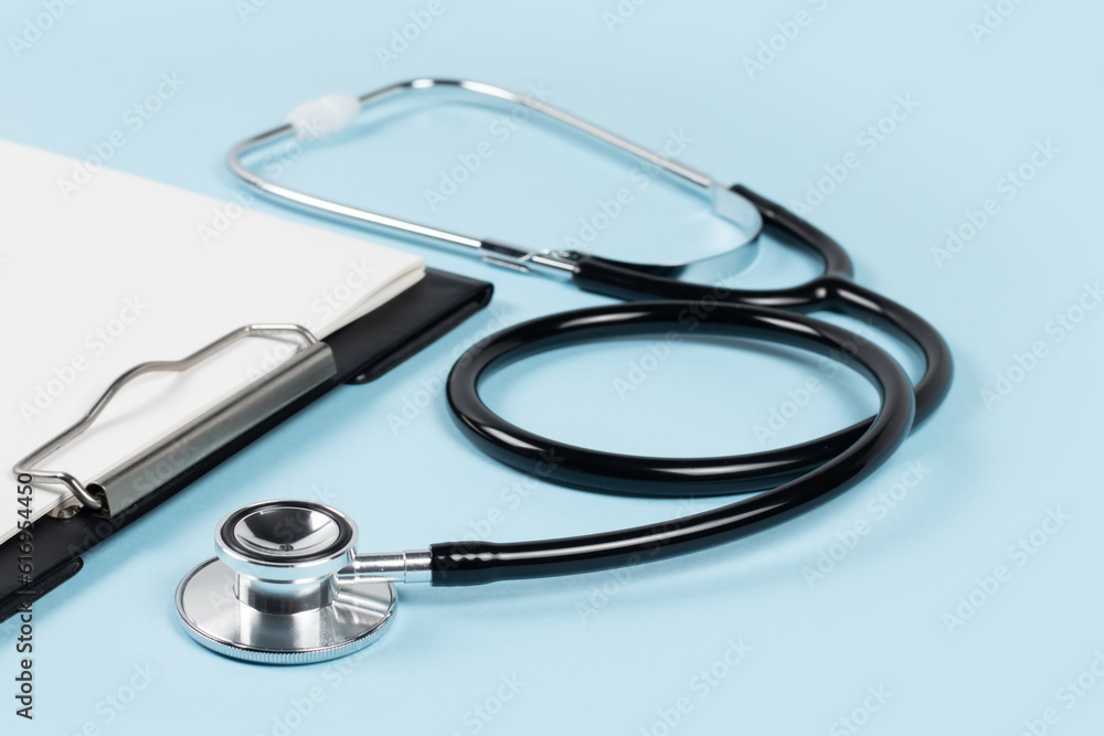 blank clipboard with modern stethoscope, space for messages blank clipboard with modern stethoscope, space for messages