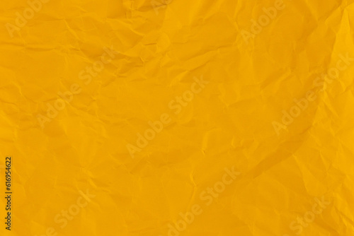 Clean yellow paper, wrinkled, abstract background.