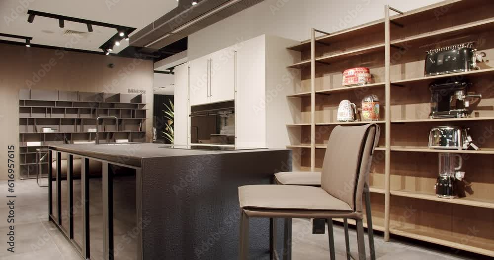 Modern white wooden kitchen room furniture with modern brown chairs. Elegant, Comfortable and Minimalist Home. Domestic Kitchen with modern black sink. Modern Kitchen room with minimalist dining table Modern white wooden kitchen room furniture with modern brown chairs. Elegant, Comfortable and Minimalist Home. Domestic Kitchen with modern black sink. Modern Kitchen room with minimalist dining table
