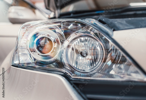 Fotografie Car headlight in workshop